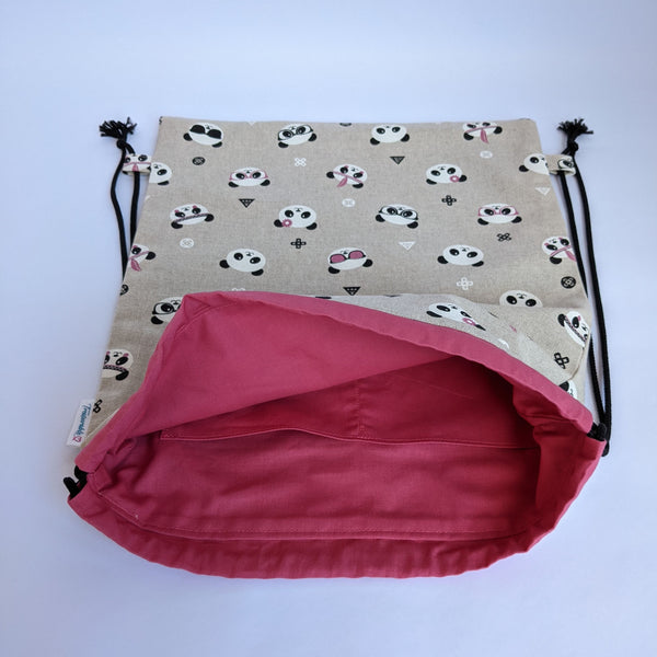 Open Panda Drawstring backpack with Medium pink lining and black drawcords. Two internal pockets
