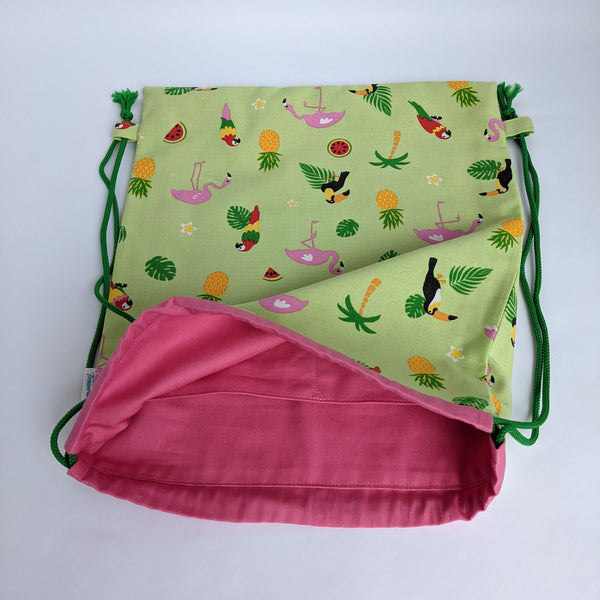 Open Tropical bird Drawstring bag with bubblegum pink lining and grass green drawcords. Two internal pockets