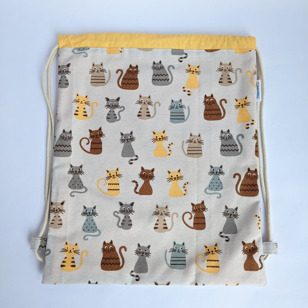 Classic Cats Drawstring backpack with corn yellow lining and natural drawcords