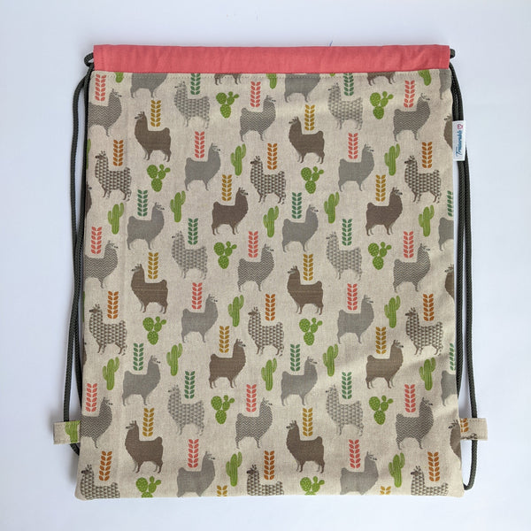 Llamas Drawstring backpack with coral pink lining and dark grey drawcords