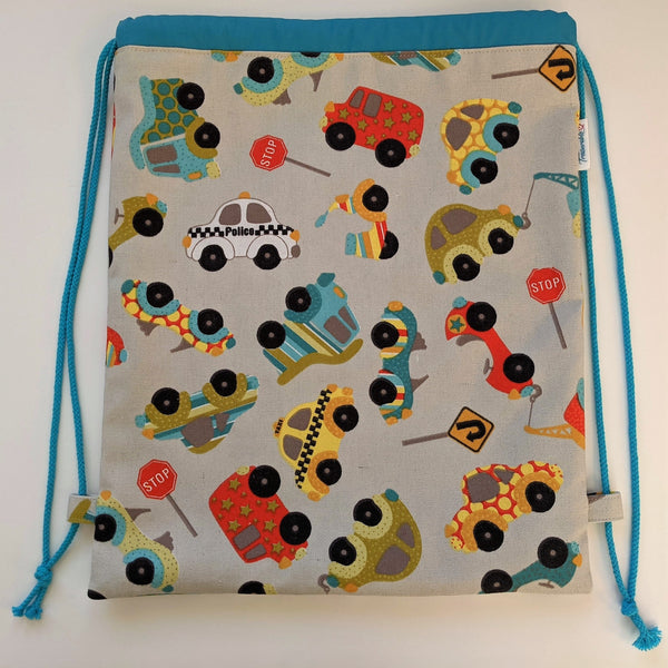Toy vehicles drawstring bag with turquoise lining and drawcords
