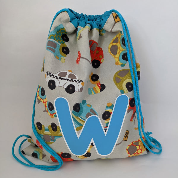 Personalised (with initial) Toy vehicles drawstring bag with turquoise lining and drawcords