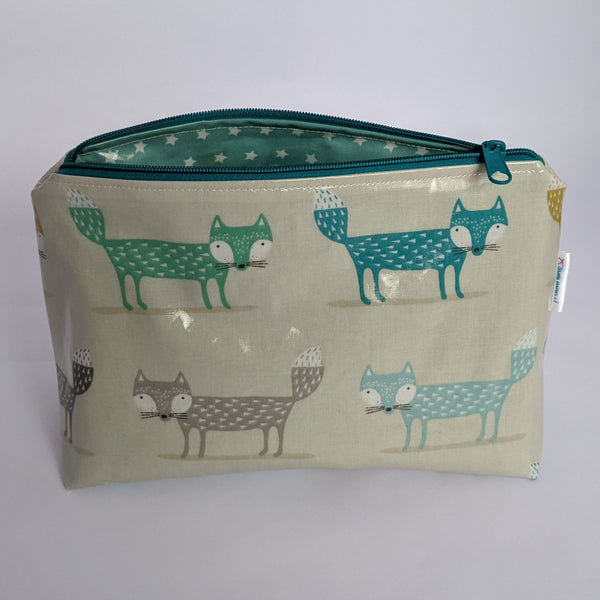 Unzipped, Medium Teal Fox Oilcloth Make-up, Cosmetic, Toiletry bag with Teal Stars Oilcloth Lining