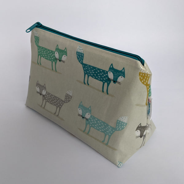 Side View of Medium Teal Fox Oilcloth Make-up, Cosmetic, Toiletry bag
