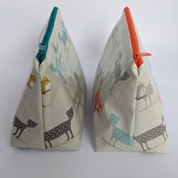 Side view of Medium Teal & Orange Fox Oilcloth bag/ Pouch