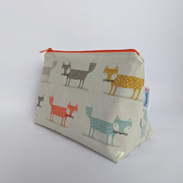 Side View of Medium Orange Oilcloth Bag, Cosmetic Bag, Wash Bag and Toiletry Bag