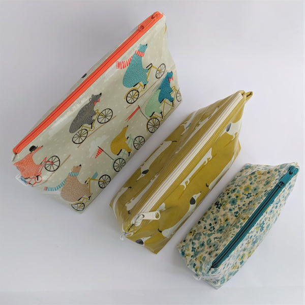 Top view of Oilcloth Wash Bags, Cosmetic Bags, Toiletry Bags in 3 sizes