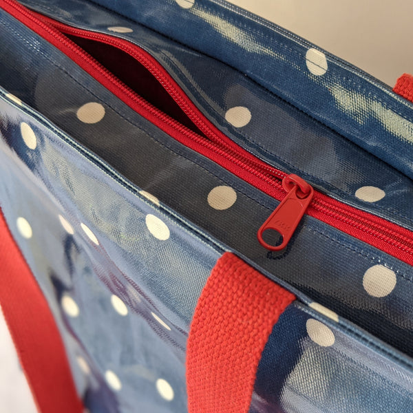 Close up of Recessed zip on Demin Blue, Large Oilcloth Shoulder bag with recessed red zip and Cotton Webbing handles