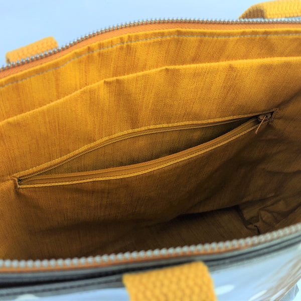 Close up of internal zip pocket in Grey Polka Dot, Large Oilcloth Shoulder bag with recessed zip and Cotton Webbing handles.