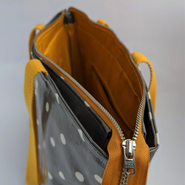 Unzipped, Grey Polka Dot, Large Oilcloth Shoulder bag with recessed zip and Cotton Webbing handles and mustard lining with internal open and zip pocket